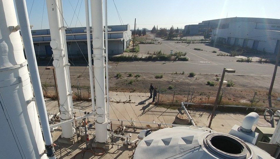 Treatment site with piping and tanks